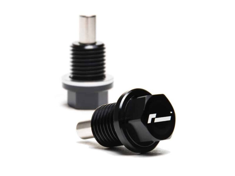 VWR180006_4jpg - OPSHOLDERS Two black metal threaded fittings with hexagonal bases resting on a white surface.