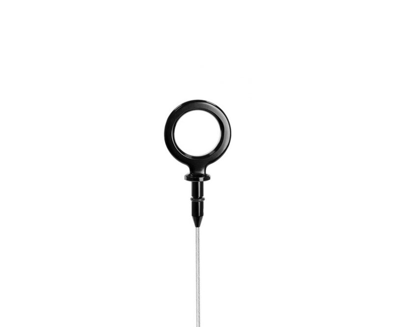 VWR190010_3jpg - OPSHOLDERS Close-up of a circular black device ring with a braided cable extending downward from its base.