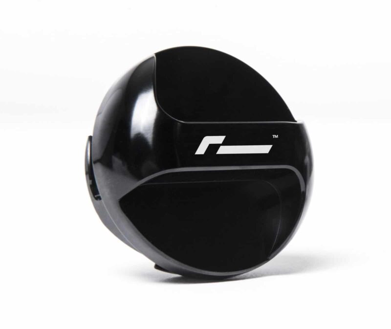 Close-up of a glossy black round device with a white stylized 'P' logo on its side.