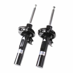 VWR30G500-2__587531528272774-1jpg - OPSHOLDERS Pair of black automotive shock absorbers with chrome piston rods on a white background, viewed from a slight angle, ready for installation.