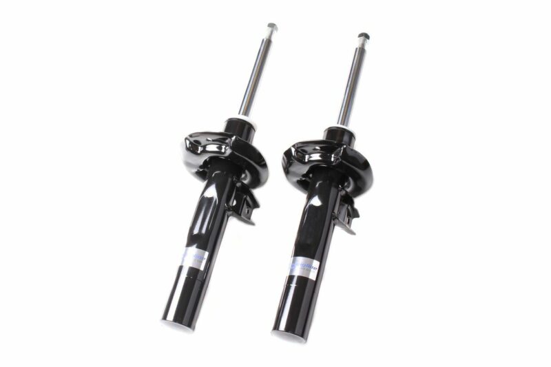 VWR30G500-2__587531528272774-1jpg - OPSHOLDERS Pair of black automotive shock absorbers with chrome piston rods on a white background, viewed from a slight angle, ready for installation.