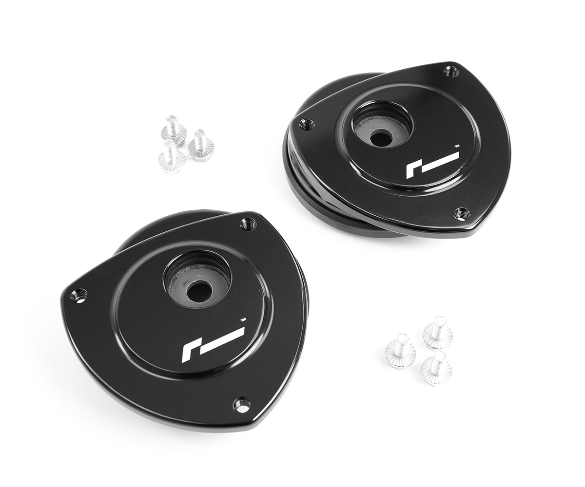 VWR430000_10jpg - OPSHOLDERS Pair of black round mounting plates with central bore and four corner holes, plus small screws (car/gear hardware).