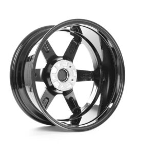 Black five-spoke alloy wheel rim with a polished lip, photographed at an angle to show depth and center hub.