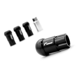Black universal bicycle pump head with four interchangeable nozzles arranged in a line on a white background, ready for valve adapters.