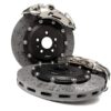VWR651000-1jpg - OPSHOLDERS Pair of high-performance brake rotors with a silver caliper resting on top, shown against a white background.
