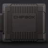 audi-a2-8z2000-2005-chipbox-seletron-2jpg - OPSHOLDERS Dark metal CHIPBOX enclosure with cooling fins and a left-side connector, a rugged hardware module for processing/edge computing.