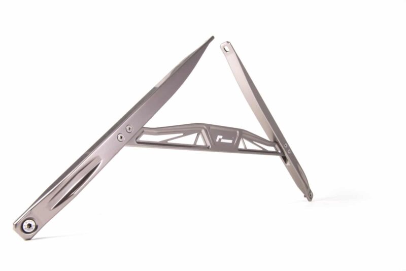 audi-b9-a4s4-strut-brace_40768630260_o-1jpg - OPSHOLDERS Folding aluminum laptop stand in an A-frame position with a triangular brace for support, shown in silver.