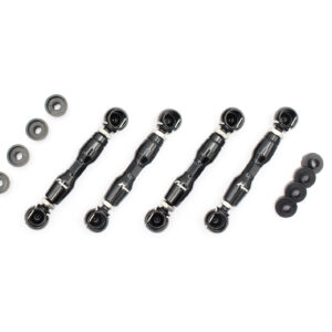 Four black robotic arms with circular tips laid diagonally on a white surface, with scattered round washers nearby.