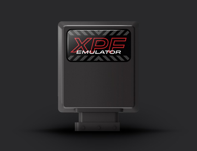 bmw-m8-f91-f92-f93-2019-xpf-emulator-opf-gpf-seletronjpg - OPSHOLDERS Black rectangular emulator device with a red XPE label on the top panel, standing on a small base against a dark background (XPE Emulator).