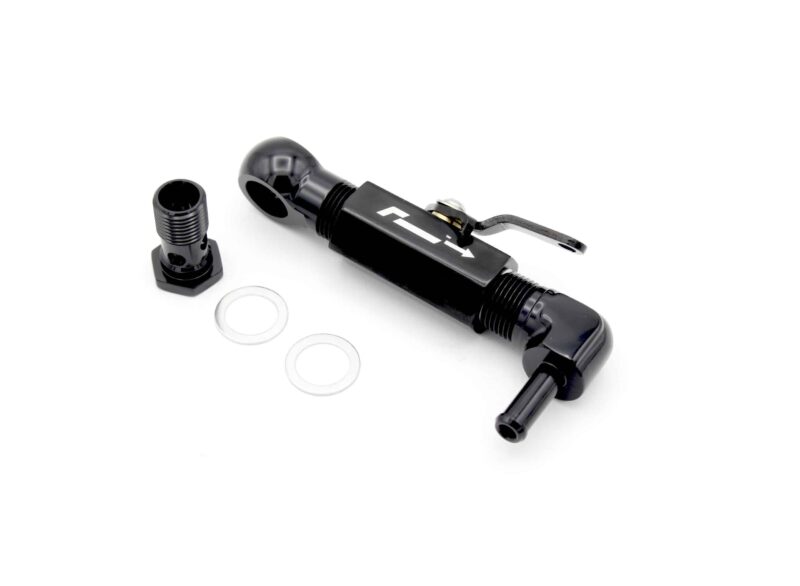 Handheld black air pump with hose and nozzle, along with several white circular washers on a white background