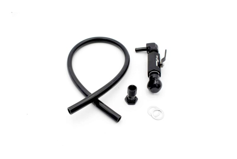 Black bicycle pump with coiled hose and valve adapters on a white background.