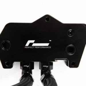 dsg-cooler-dq250_49501426127_o-scaled-2jpg - OPSHOLDERS Close-up of a black mounting plate with multiple circular holes and the 'PERFECT PERFORMANCE' logo visible on the surface.