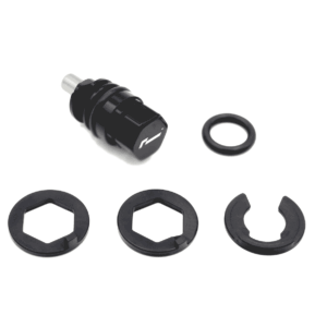 Black plastic tool with several circular, ring-shaped spacers laid out on a white background; includes a small metal/nose piece and multiple hex-like rings for assembly.3a8 // concise description of the kit contents and layout