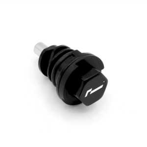 Close-up of a black, multi-ring mechanical knob with a white logo on a white background, viewed from above.