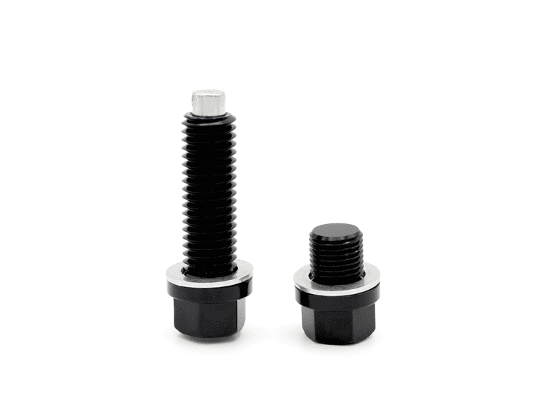 haldex-magnetic-plug-set_50810004203_o-1png - OPSHOLDERS Two black bolts with silver washers and hex heads, one tall and one short, on a white background.