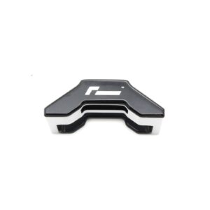 lower-motor-mount-twin-dogbone-inserts_52731172597_o-1jpg - OPSHOLDERS Close-up of a black plastic mounting bracket with a white interior, partially visible at the bottom on a white background.