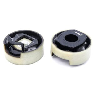 lower-motor-mount-twin-dogbone-inserts_52731701121_o-2jpg - OPSHOLDERS Pair of damaged caster wheels with cracked plastic housings on a white background, showing internal components.