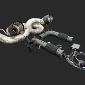 Aftermarket car exhaust header with twin pipes and a wiring harness beside it.