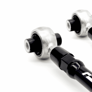 Close-up of a black dumbbell bar with chrome collars against a white background.