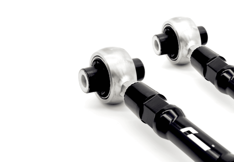 Close-up of a black dumbbell bar with chrome collars against a white background.