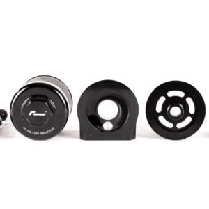 oil-cooler-vwr18-g700_45869746371_o-scaled-1jpg - OPSHOLDERS Assorted bicycle components (pulleys, bearings and hubs) arranged in a row on a white background, showing black metal disks and hardware parts for a derailleur system.