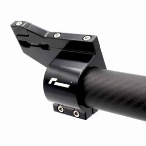 Close-up of a black bicycle stem clamp attached to a carbon fiber handlebar, with several silver screws visible