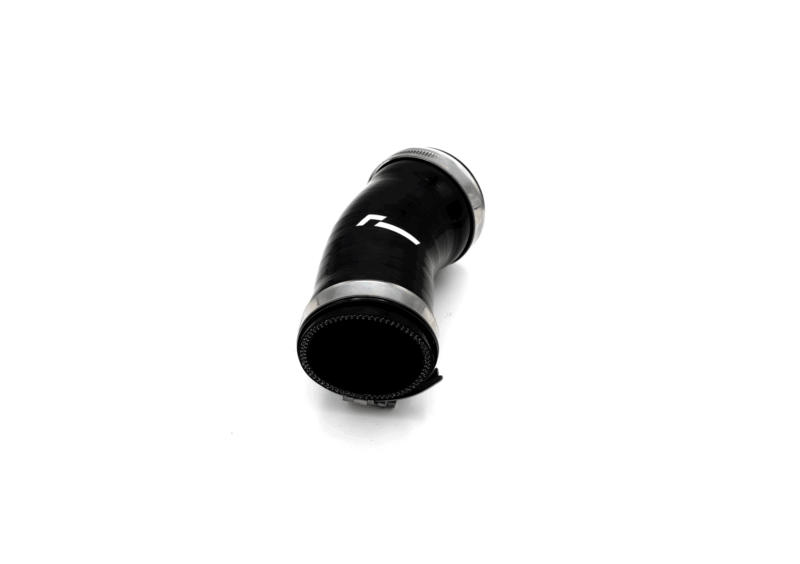 Close-up of a black camera lens barrel with silver rings on a white background, angled diagonally downward to the left.