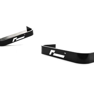 propshaft-bearing-alignment-kit_51768529311_o-scaled-2jpg - OPSHOLDERS Three black curved plastic strips with a white logo, spaced on a white background.