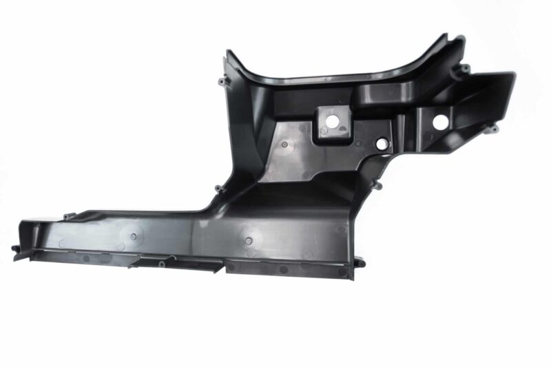 r600-evo-with-new-top-and-base-moulding-for-the-new-mqb-evo-cars_51819024725_o-scaled-2jpg - OPSHOLDERS Black plastic automotive body panel, likely an undercarriage splash shield or inner fender section, photographed close up against a white background