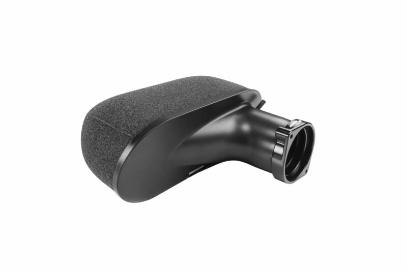 Close-up of a black handheld microphone with a textured foam windscreen. This image shows the mic body and connector end close-up.