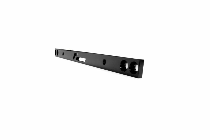racingline-front-subframe-brace-10_51826000516_o-scaled-2jpg - OPSHOLDERS Long black metal mounting rail with circular holes and a rectangular slot, viewed at an angle.