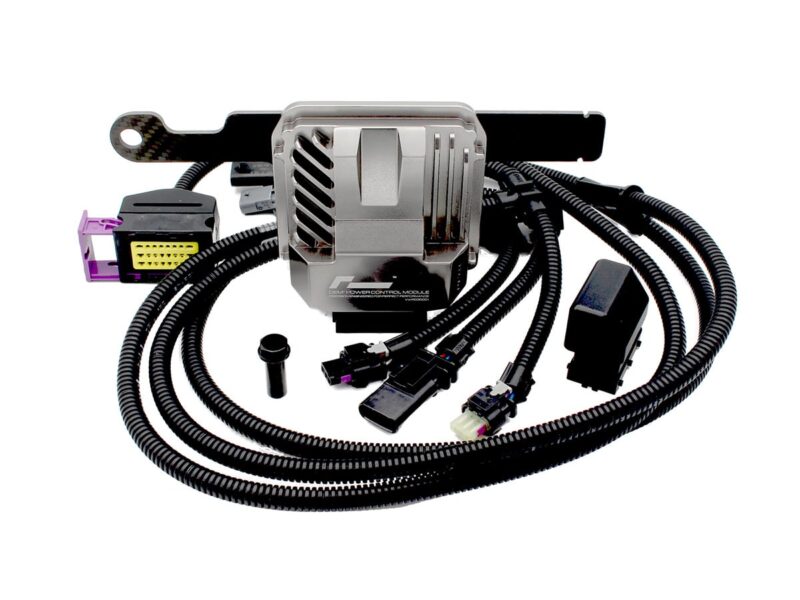 OEM power control module with multiple connectors and bundled wiring harness on a white background
