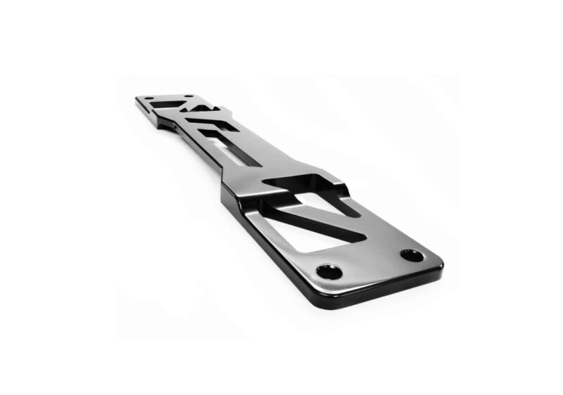 Shiny stainless steel surgical retractor with slotted design, held at an angle to show its forks and holes.