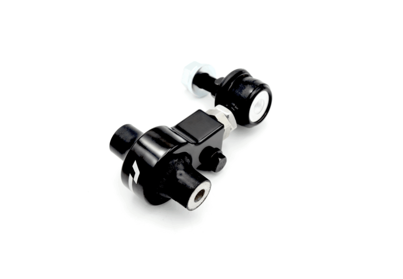 Close-up of a black metal valve fitting or connector with a silver hex nut, set against a white background.