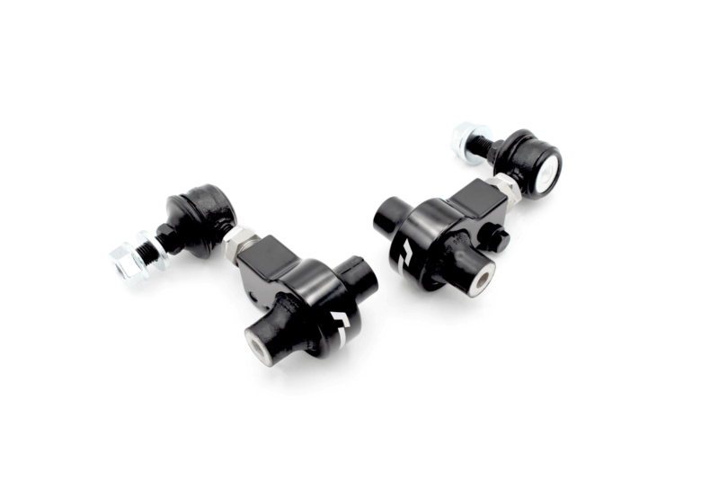 Black metal hydraulic/pneumatic fittings with bolts on a white background, arranged diagonally