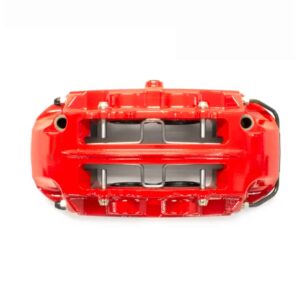 Red toy car viewed from above, showing its open interior and chrome axles/suspension details