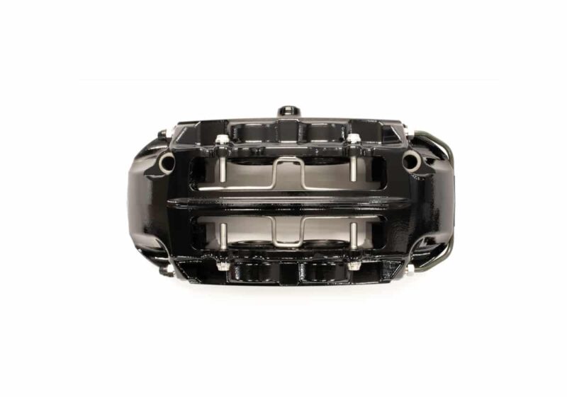 Black car brake caliper seen from above, with pistons and mounting hardware visible on a white background.