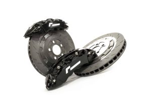 stage-2-evo-brake-kit_51479161930_o-scaled-2-300x211-1jpg - OPSHOLDERS Automotive brake components: two vented brake rotors with attached calipers and brake pads