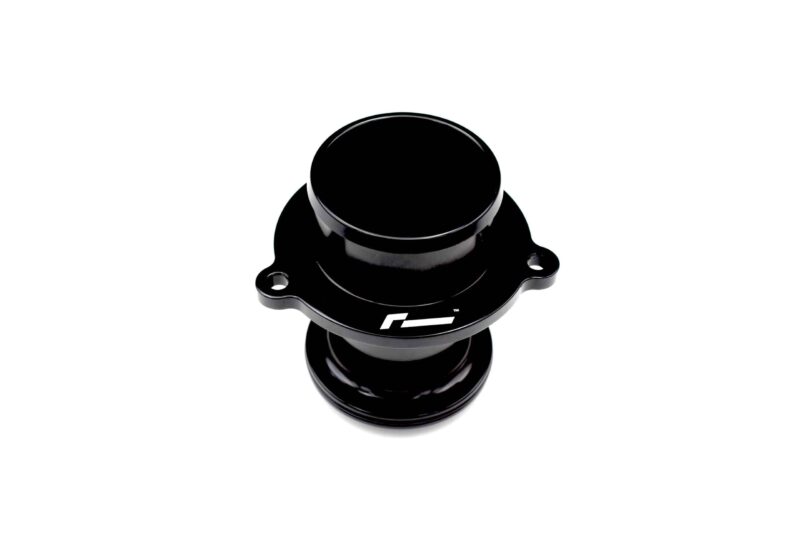 Close-up of a glossy black round knob with a metal flange and mounting holes around the edge, seen from above.