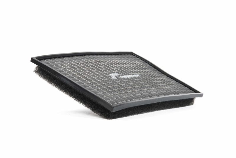 Rectangular car air filter with a metal grid and black foam frame.