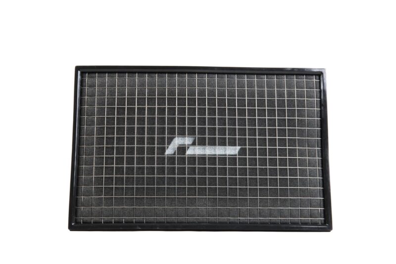 Close-up of a black-framed solar panel showing a grid of photovoltaic cells.