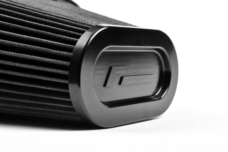 vwr12-g7r600f0_49426461577_o-scaled-2jpg - OPSHOLDERS Close-up of a pleated black air filter with a metallic end cap, showing textured fabric folds.