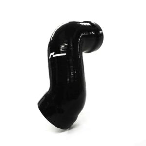 Close-up of a shiny black curved object on a white background.
