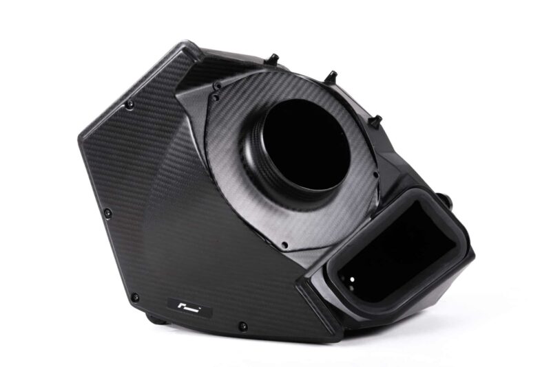 vwr1241s4_44956459005_o-scaled-2jpg - OPSHOLDERS Carbon fiber car air intake housing with circular duct opening in view.