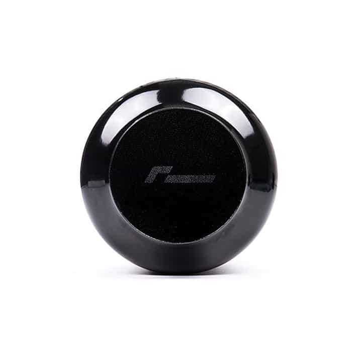 vwr12g60d-zoom-1jpg - OPSHOLDERS Round glossy black Bluetooth speaker with a circular front panel on a white background.