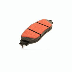 Automotive brake pad with red friction material on a black backing plate, shown at an angle.