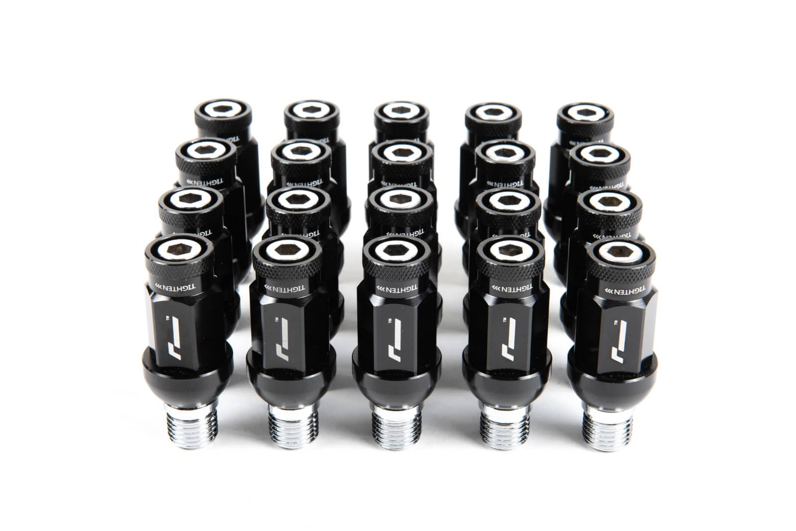 wheelnuts-25_44956389225_o-1jpg - OPSHOLDERS Row of black tire valve cores with metal threaded ends on a white background
