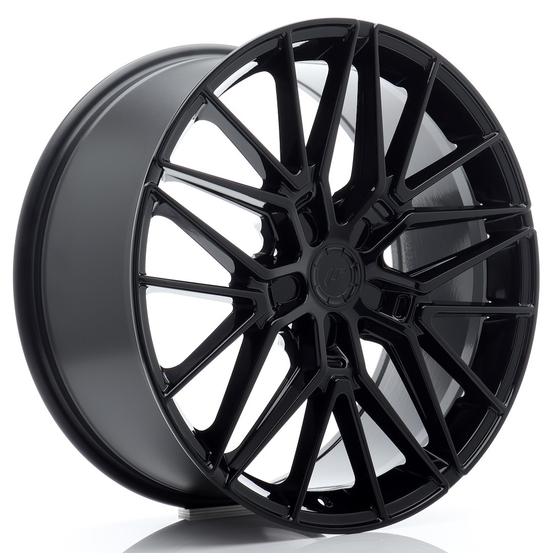 52807_0_39183jpg - OPSHOLDERS Black glossy multi-spoke alloy car wheel photographed from the side.