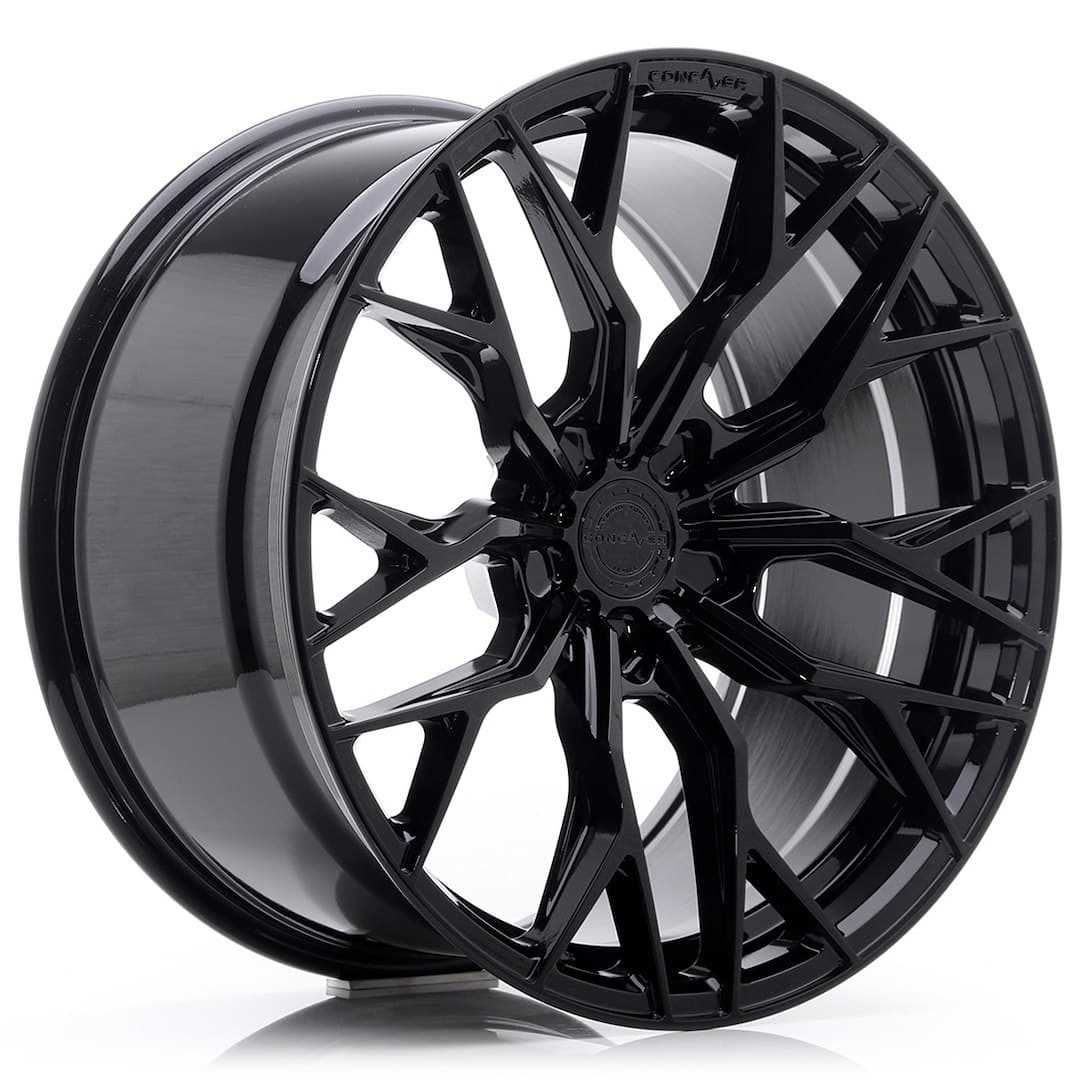 53687_0_39360jpg - OPSHOLDERS Glossy black alloy car wheel rim with an intricate multi-spoke design