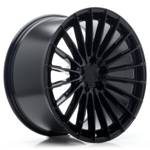 Black glossy alloy car wheel with many spokes shown at an angle, center hub visible